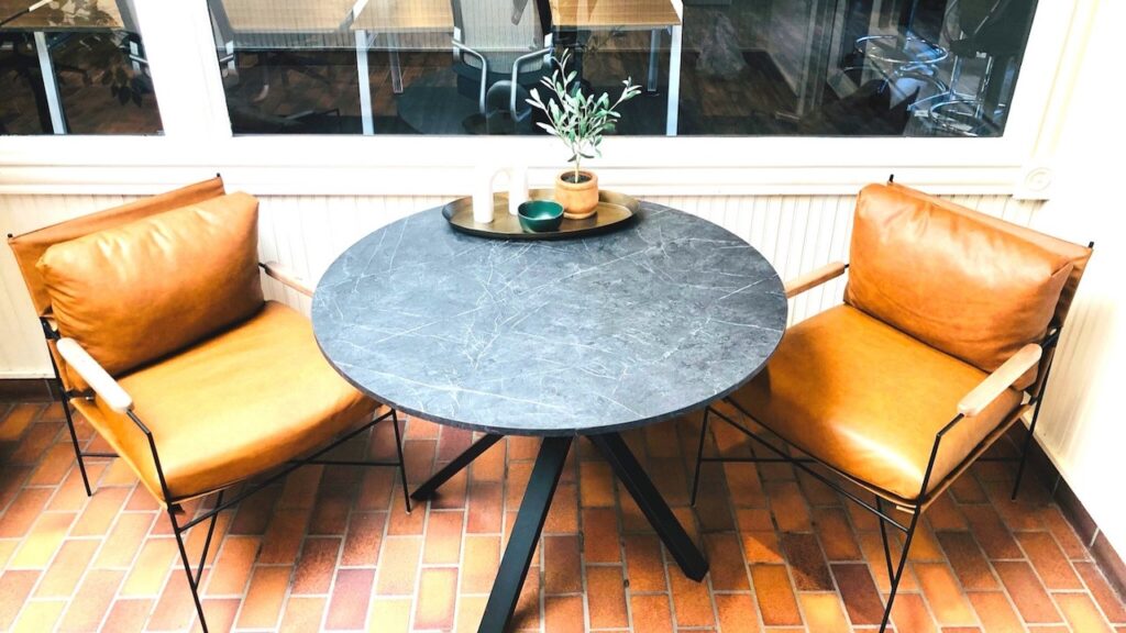 Hallway seating with leather chairs