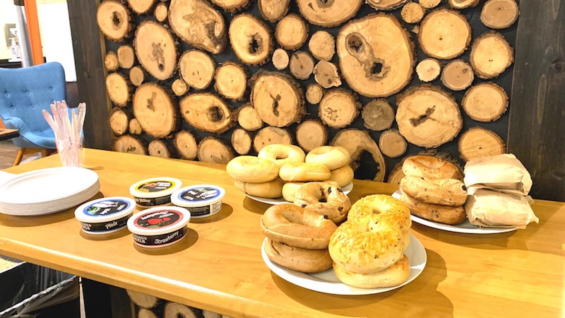 Weekly member breakfast spread of bagels